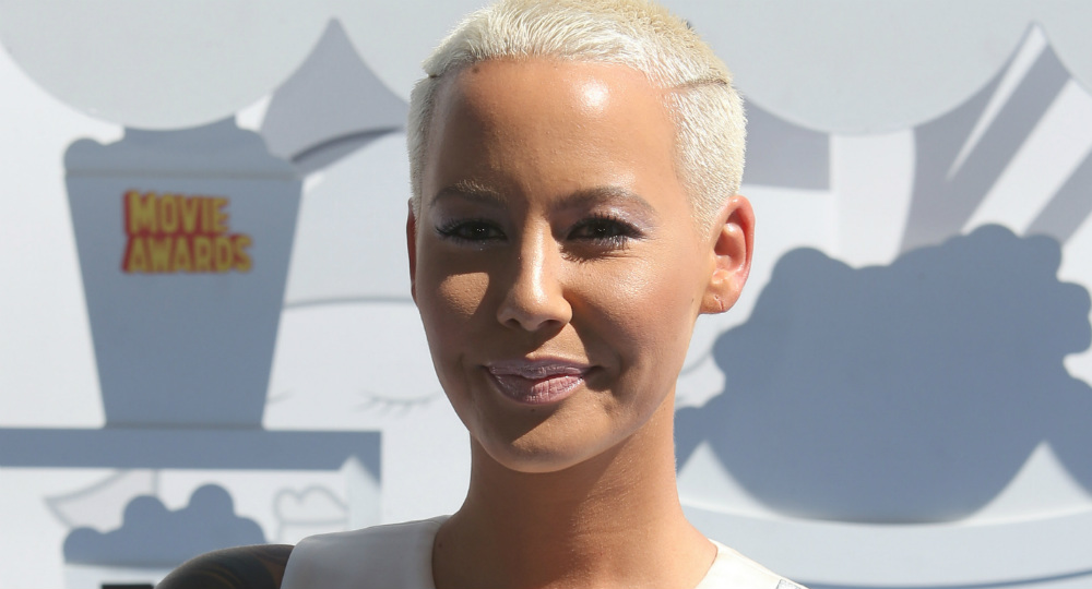 Amber Rose Looks Completely Different with Dark Hair and Blue Contacts