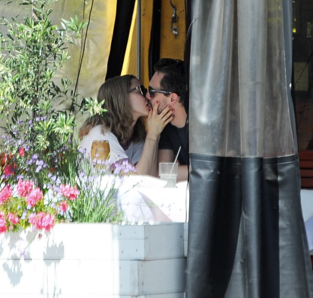 Making out at Cheebo's in West Hollywood March 16. Photo: Wenn