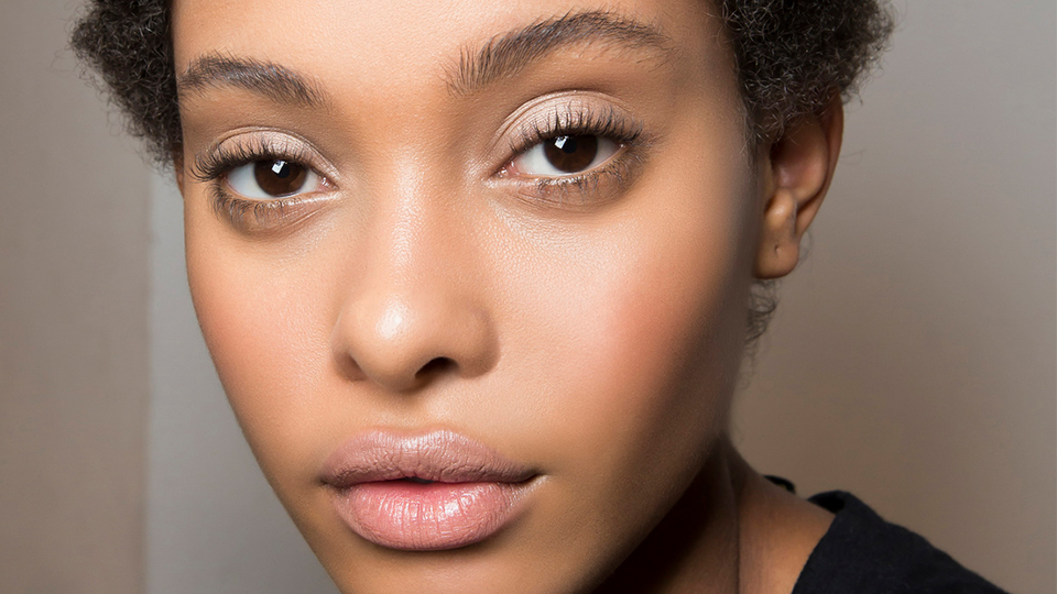 best drugstore blushes-blush brown curly hair girl