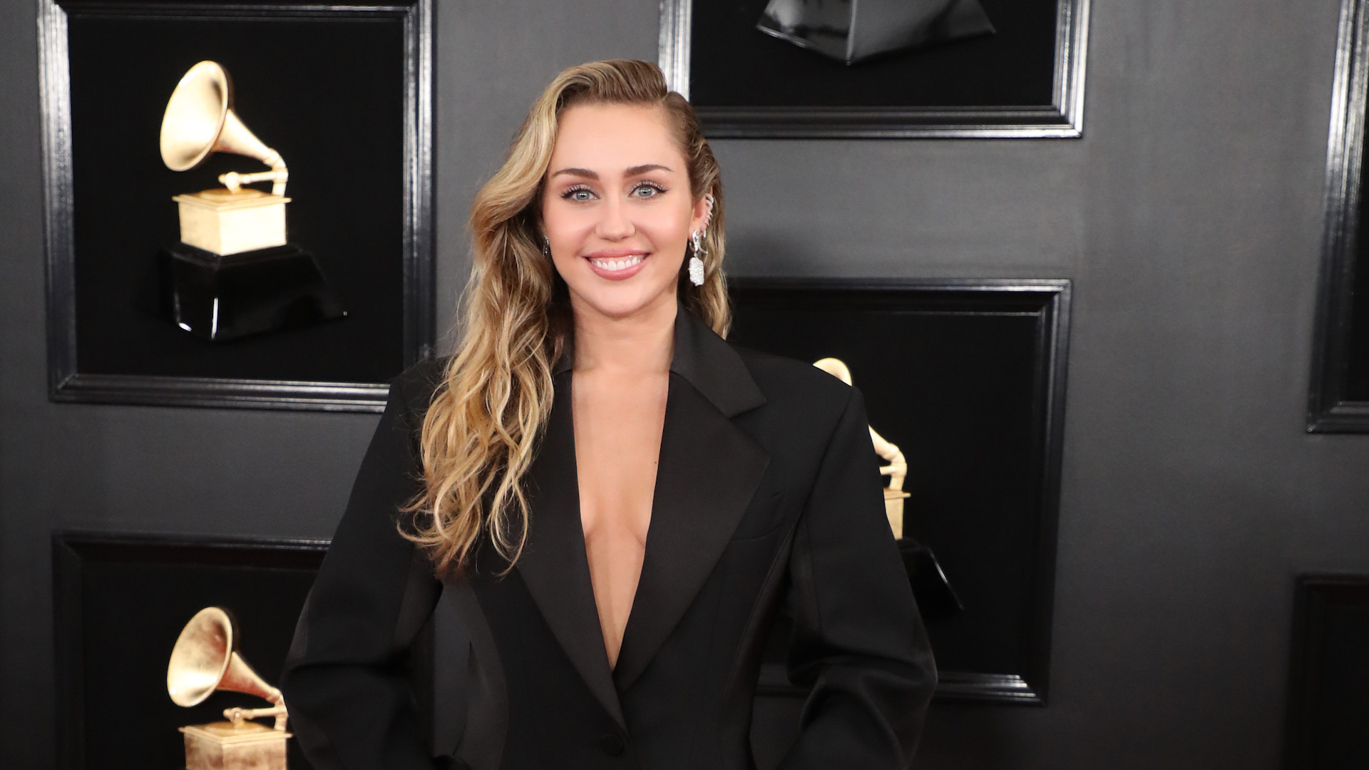 Miley Cyrus' 2019 Grammys Look Is Hot (& Maybe Braless)