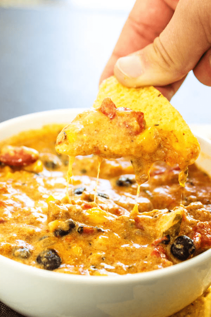 STYLECASTER | 17 Stoner Snacks You Can Actually Whip Up in the Slow-Cooker | Chili Cheese Dip