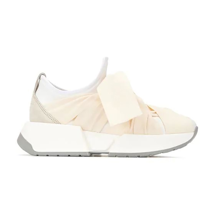 STYLECASTER | Dainty White Sneakers You Could Definitely Wear Under Your Bridal Gown