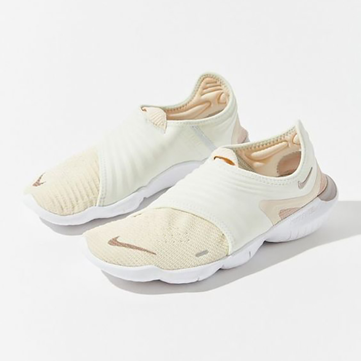 STYLECASTER | Dainty White Sneakers You Could Definitely Wear Under Your Bridal Gown