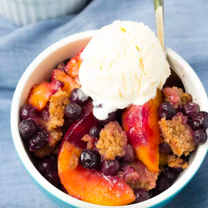 STYLECASTER | 17 Slow-Cooker Snacks That Really Speak To Your PMS Cravings | Blueberry Peach Cobbler