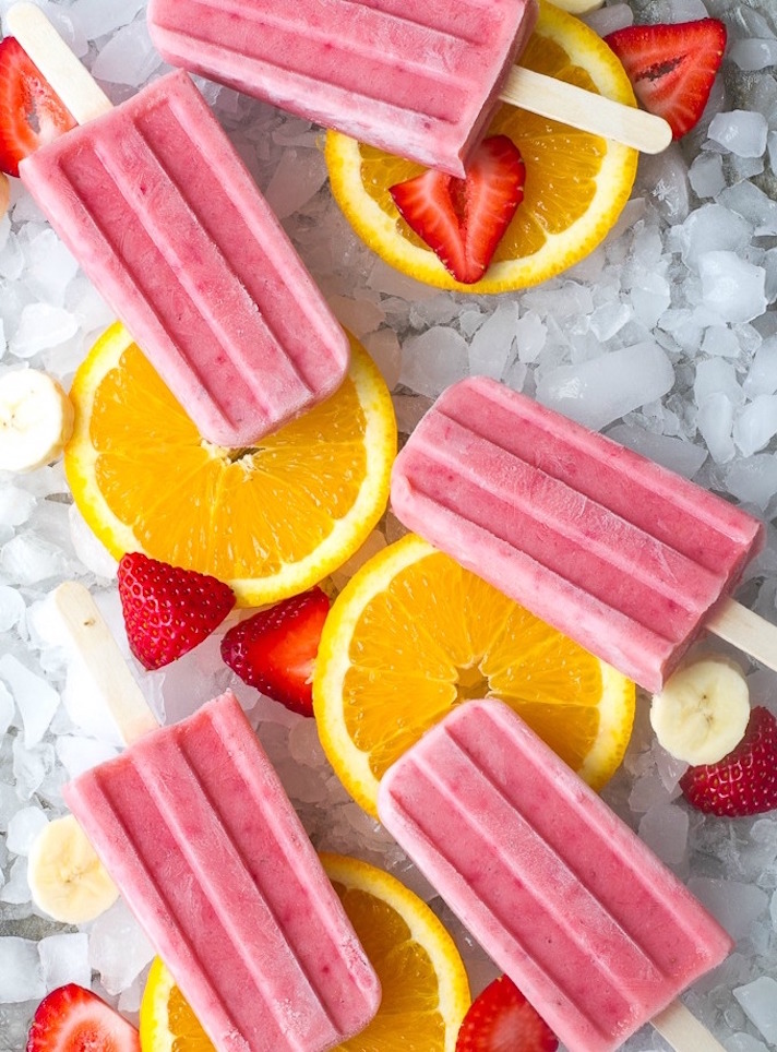 STYLECASTER | 17 DIY Popsicles To Make With All That Summer Fruit | Strawberry-Orange-Banana Popsicles