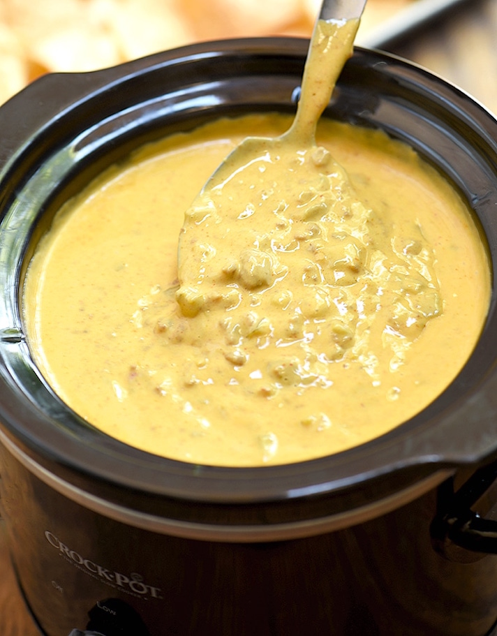STYLECASTER | 17 Slow-Cooker Queso Dips So Sexy, I Could Cry | Beef Queso Dip