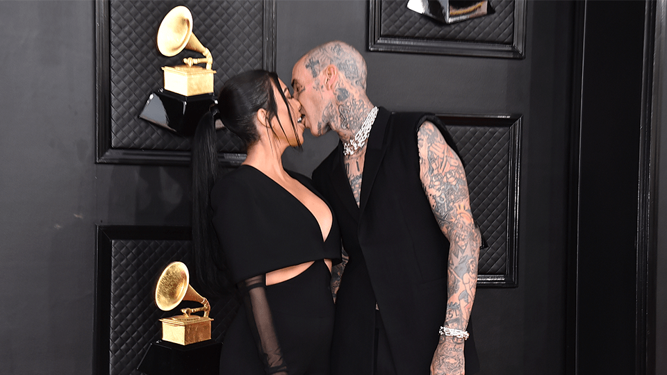 STYLECASTER | Kourtney Kardashian Travis Barker Grammys Looks 2022