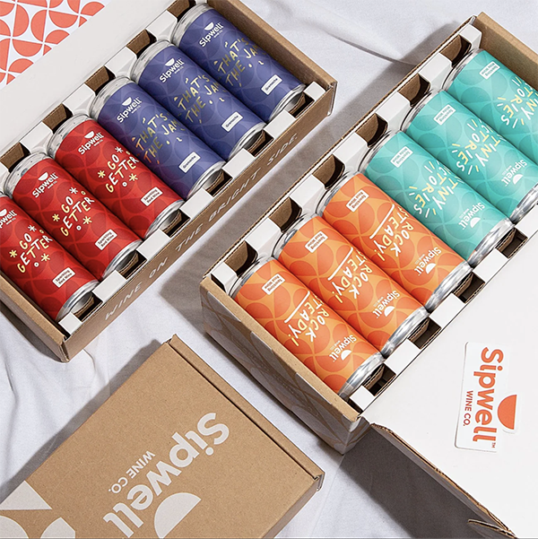 Two boxes of canned wines