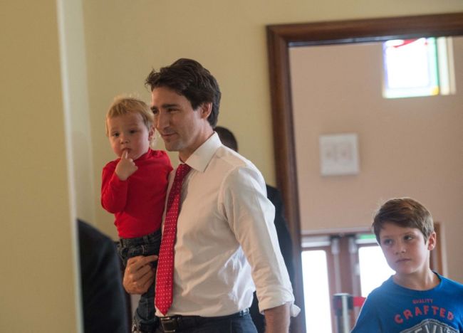 Canadian Liberal Party leader Justin Trudeau walks with his sons Xavier and Hadrien.