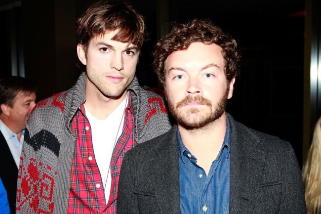 Actors Ashton Kutcher and Danny Masterson pose at the Gallery for the People: Spring Collection on March 6, 2012 in West Hollywood, California.