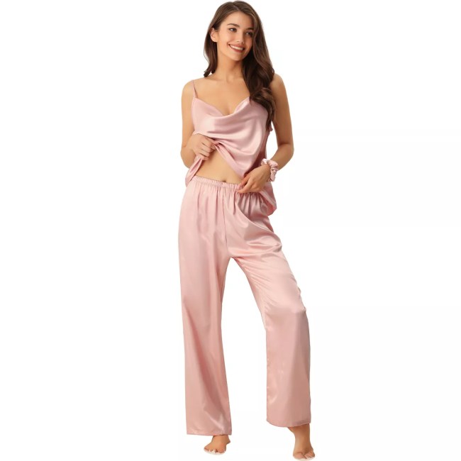 A model wearing light pink satin pajamas from Target