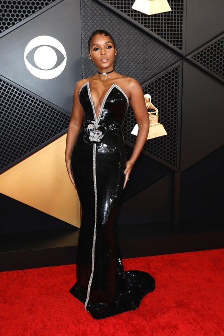 Janelle Monae at the 2024 Grammys in a black sequin gown and black choker