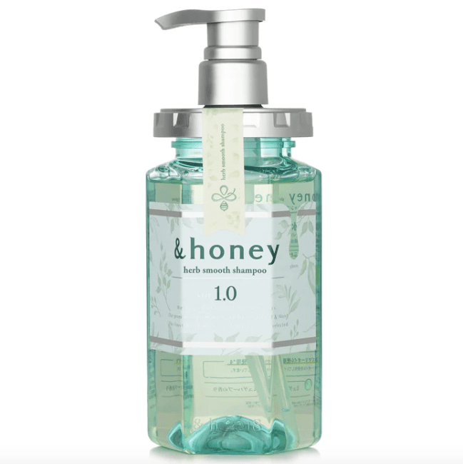 &Honey Herb Smooth Shampoo in a teal bottle with a silver pump