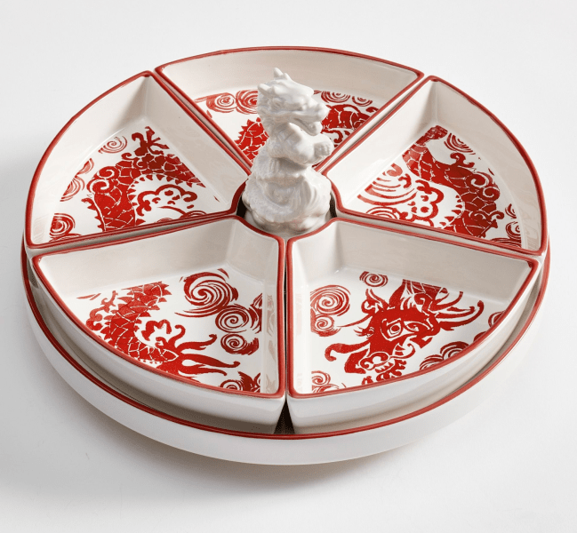 A red and white dragon-printed lazy Susan from Pottery Barn