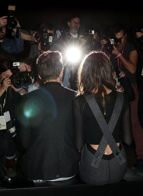 Louis Tomlinson and girlfriend Eleanor Calder attends the Unique show during London Fashion Week Fall/Winter 2013/14 at TopShop Show Space on February 17, 2013 in London, England.