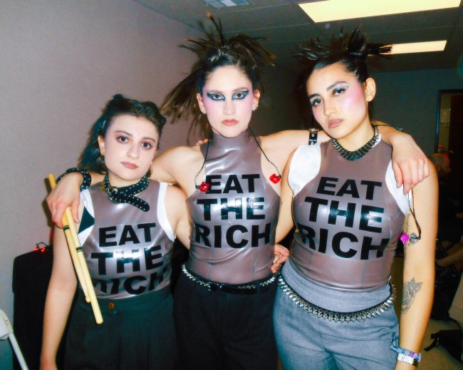 L to R: Eliza Petrosyan, Lucy Ritter, and Valeria Falcón, Chappell Roan's band, at Coachella.