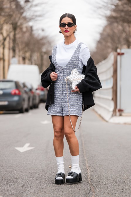 A Paris Fashion Week guest wearing mule sandals.