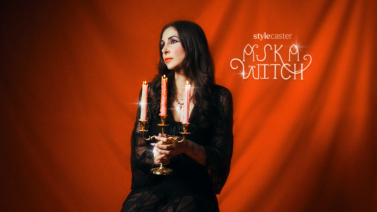 A witch woman holding a candelabra, getting ready to give someone life-saving advice using astrology.