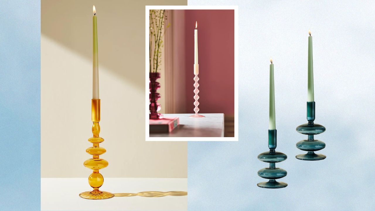 From left to right: A yellow glass candlestick holder with a green candle; a pink glass candlestick holder with a white candle; two short blue glass candlstick holders with green candles