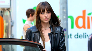 Dakota Johnson on the set of Materialists wearing a leather jacket.