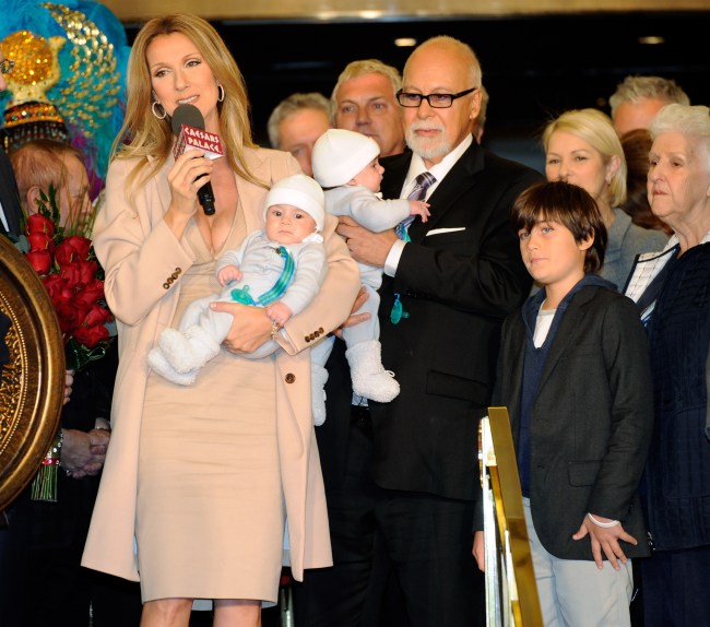 Singer Celine Dion, holding her son Nelson Angelil, her husband and manager Rene Angelil, holding their son Eddy Angelil, and their son Rene-Charles Angelil are greeted as they arrive at Caesars Palace February 16, 2011 in Las Vegas, Nevada. Celine Dion will begin rehearsals for her new show set to debut March 15 at The Colosseum at Caesars Palace.