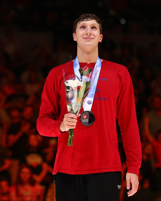 Bobby Finke and David Johnston of the United States look on during the medal ceremony for the Men's 1500m freestyle final on Day Nine of the 2024 U.S. Olympic Team Swimming Trials at Lucas Oil Stadium on June 23, 2024 in Indianapolis, Indiana.