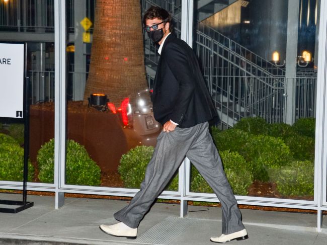 Jacob Elordi, white shoes, mask, sunglasses