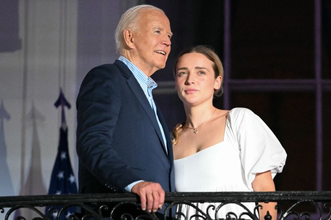 US President Joe Biden and granddaughter Finnegan Biden watch the Independence Day fireworks display from the Truman Balcony of the White House in Washington, DC, on July 4, 2024.