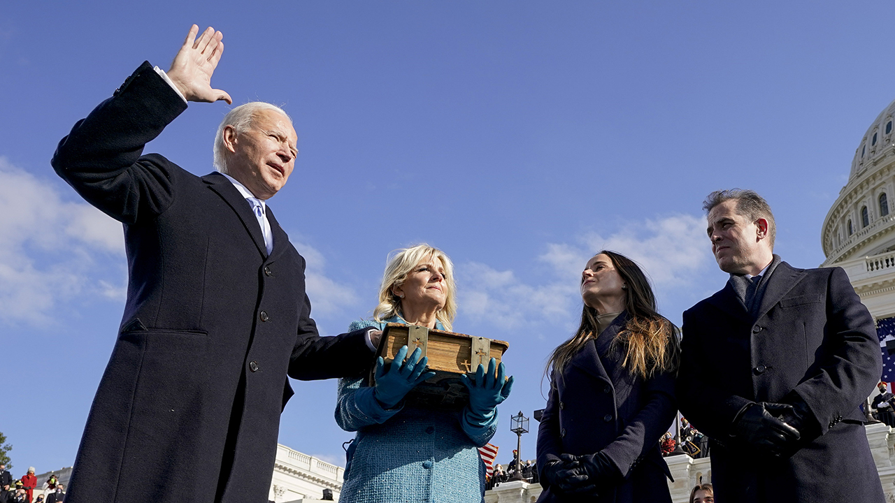 WASHINGTON, DC - JANUARY 20: Joe Biden is sworn in as the 46th president of the United States by Chief Justice John Roberts, as Jill Biden and their children Ashley and Hunter look on on the West Front of the U.S. Capitol on January 20, 2021 in Washington, DC.  During today's inauguration ceremony Joe Biden becomes the 46th president of the United States