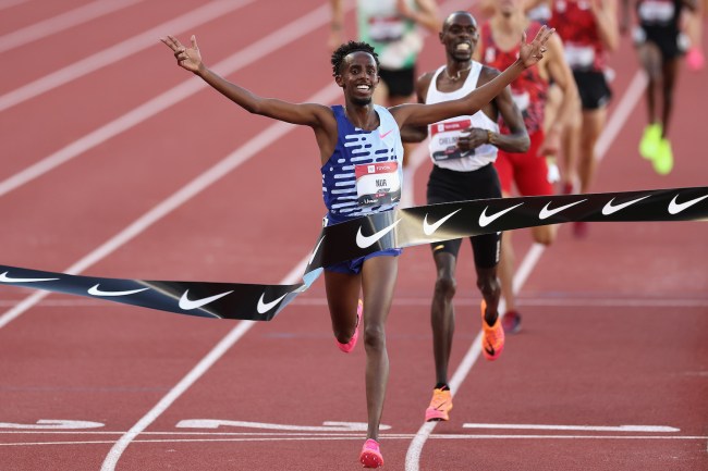 Abdihamid Nur crosses the finish line to win the Men's 5000m Final during the 2023 USATF Outdoor Championships at Hayward Field on July 09, 2023 in Eugene, Oregon.