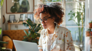 Woman working from home in office with plants