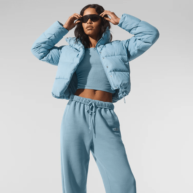 A model wearing the Gold Rush Puffer.