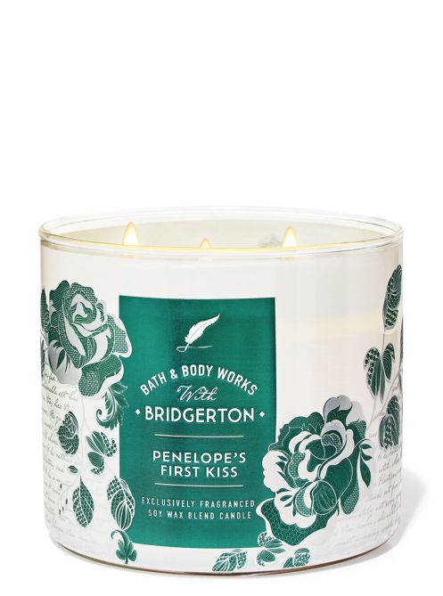 Penelope’s First Kiss 3-Wick Candle in a white jar.