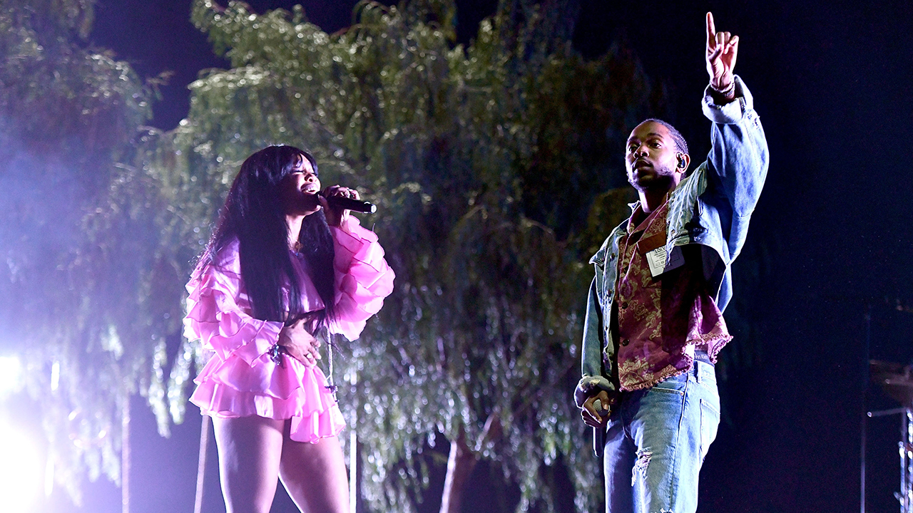 INDIO, CA - APRIL 13: Rappers SZA (L) and Kendrick Lamar (R) perform on the Coachella stage during week 1, day 1 of the Coachella Valley Music And Arts Festival on April 13, 2018 in Indio, California.