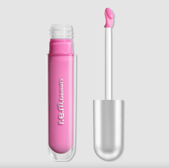 R.e.m. Beauty Essential Drip Glossy Balm in a clear tube.