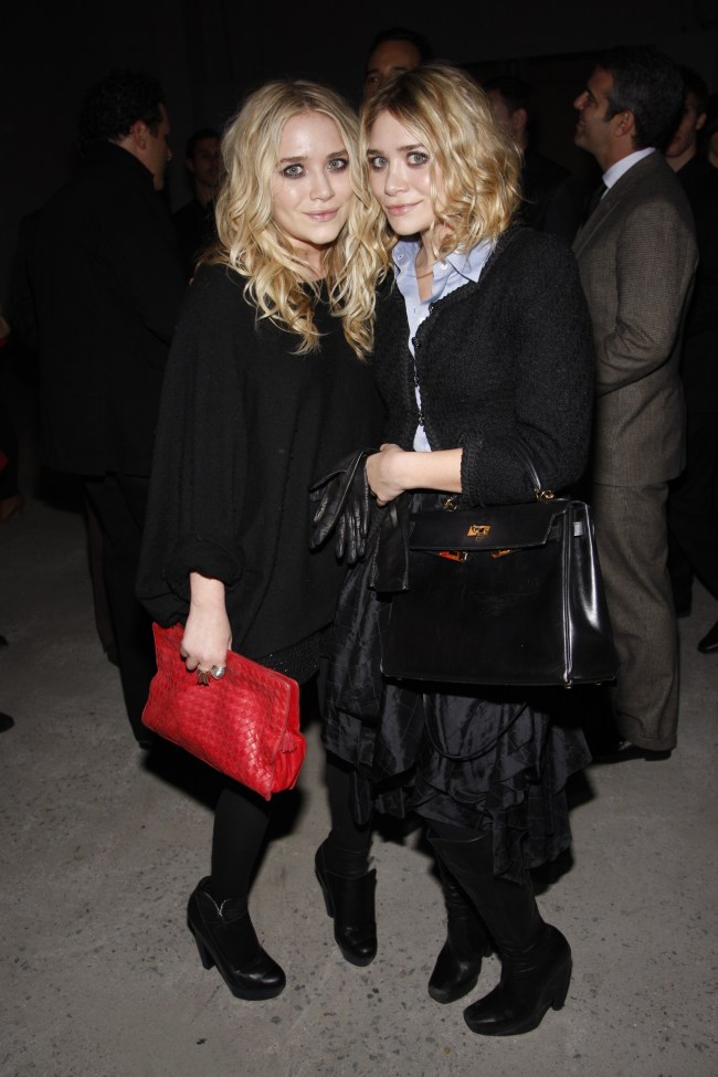 Mary-Kate Olsen (L) and Ashley Olsen attend QVC's Isaac Mizrahi Live! launch party at Stage 37.