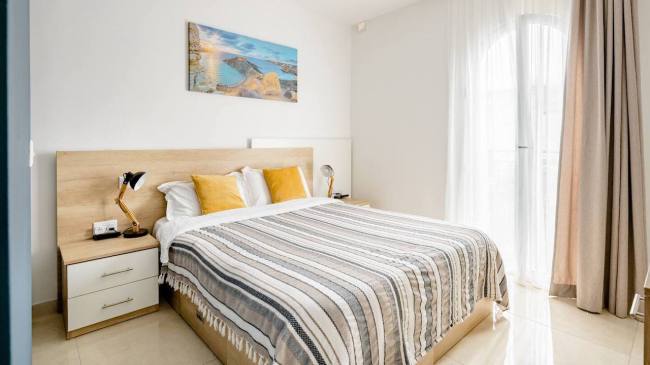 Where to Stay in Malta: Pictured here is the Marsaxlokk Room at the Hammock Vibes Townhouse AirBnb in Sliema.
