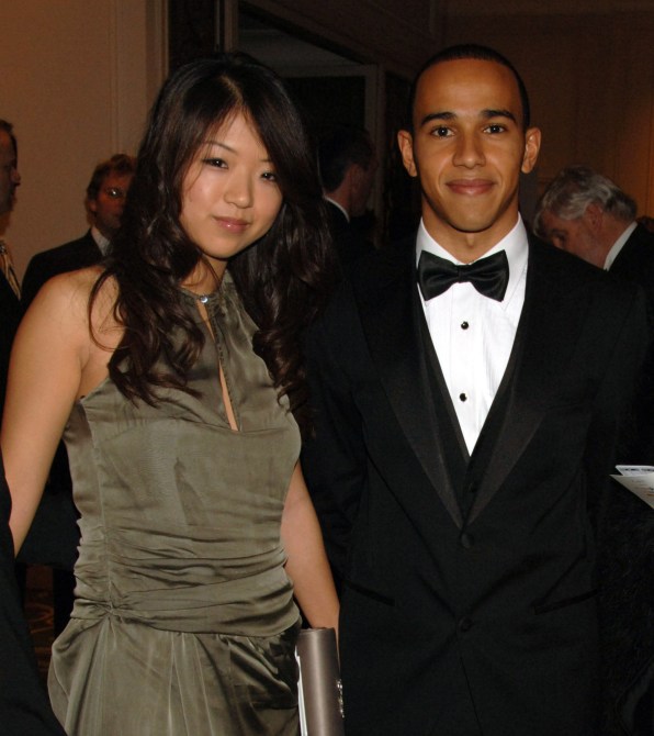 LONDON - DECEMBER 3:  Lewis Hamilton poses with his girlfriend Jodia Ma (L) at the AutoSport Magazine awards at the Grovesnor House Hotel on December 3, 2006 in London, England.