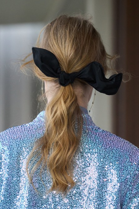 A model with a ponytail.