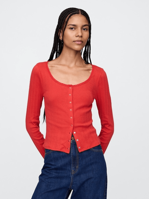 A model wearing the GAP Cropped Pointelle Cardigan in red