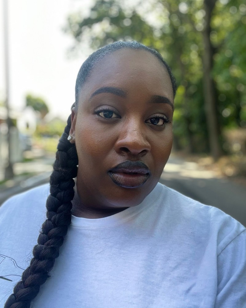 Najeema wearing the Danessa Myricks Beauty Dew Wet Hydrating and Highlighting Balm in Hot Water