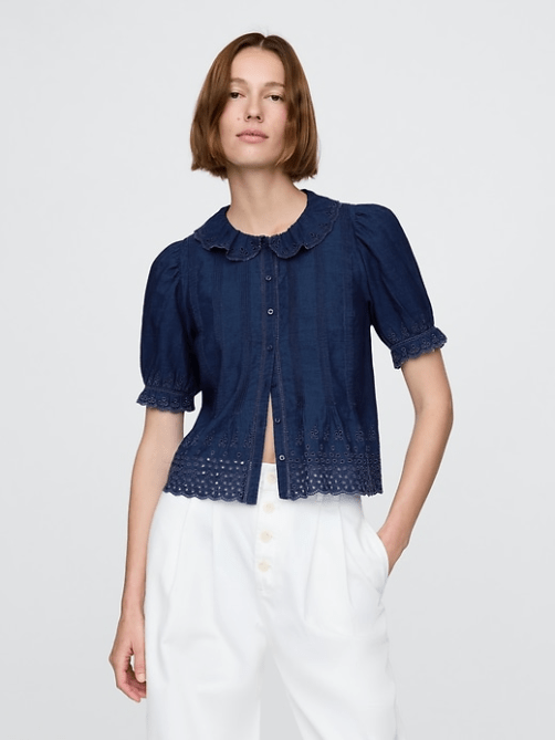 A model wearing the Gap x Dôen Eyelet Shirt in indigo blue