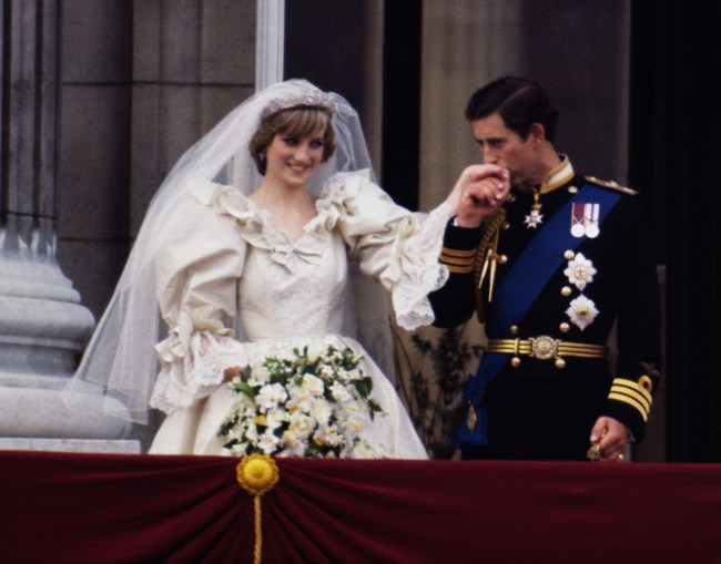 The Prince and Princess of Wales on the balcony of Buckingham Palace on their wedding day, 29th July 1981. Diana wears a wedding dress by David and Elizabeth Emmanuel and the Spencer family tiara