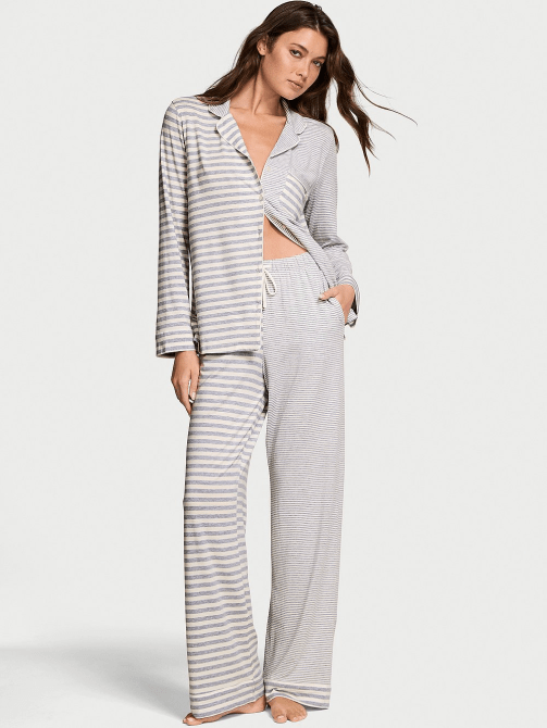 A model wearing the Victoria's Secret Modal Soft Long Pajama Set in heather grey/white stripe