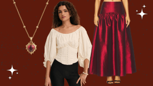 A red and gold heart necklace, a woman in a white blouse, a red maxi skirt