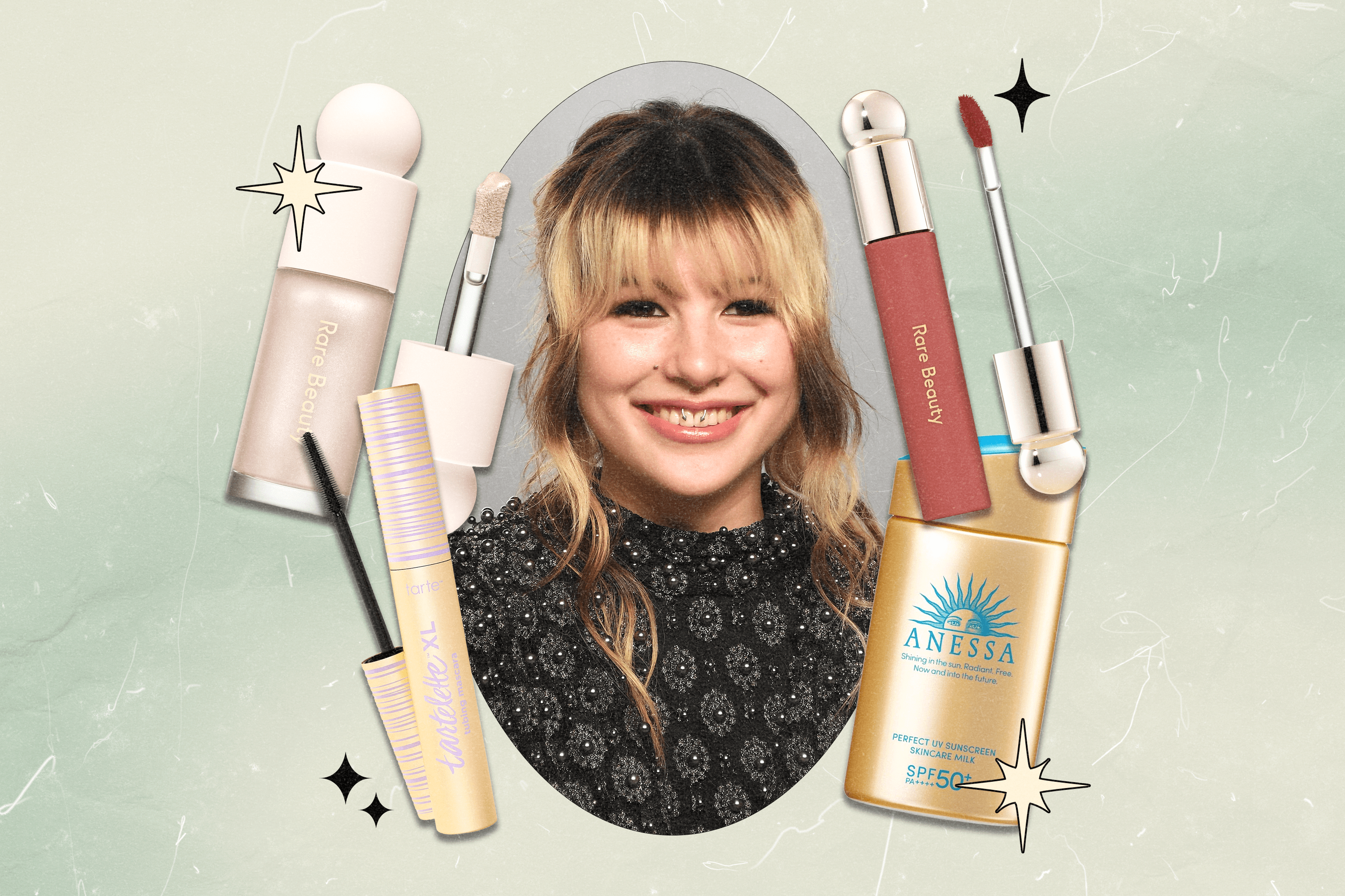 A collage with a close-up photo of Alysa Liu at the 2026 Vanity Fair Oscar Party surrounded by beauty products she uses (Rare Beauty liquid highlighter, Tarte mascara, Rare Beauty lip oil, and Anessa sunscreen).